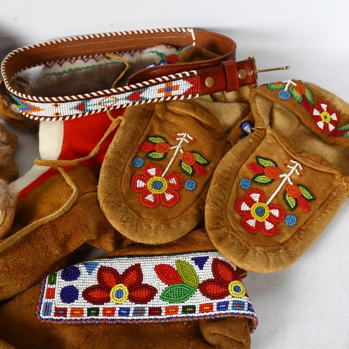 445 - Native American Indian moccasins with beadwork decoration, a pair of baby's boots, and a pair of Hud... 