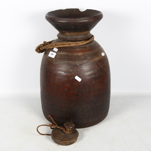 454A - An Antique turned wood pot and cover with banded decoration, H44.5cm