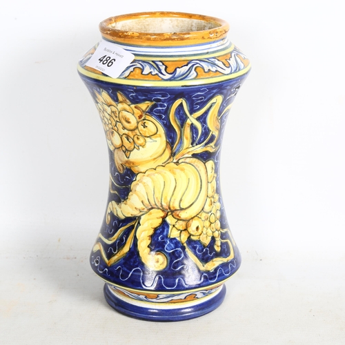 486 - An Antique Maiolica vase, decorated with a picture of a lady and various wild fruits, a hole has bee... 