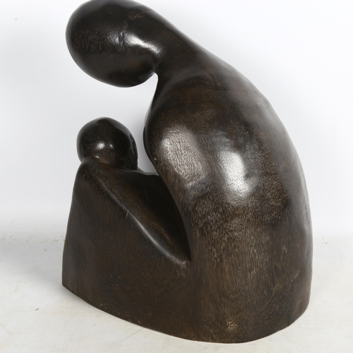 487 - A contemporary hardwood sculpture depicting a mother and child, H28cm