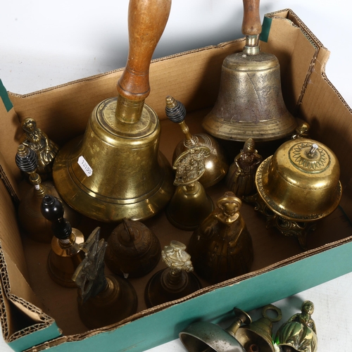 503 - 2 brass hand bells with turned wood handles, and desk bells