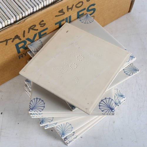 509 - A boxful of Rye tiles with painted designs of shells