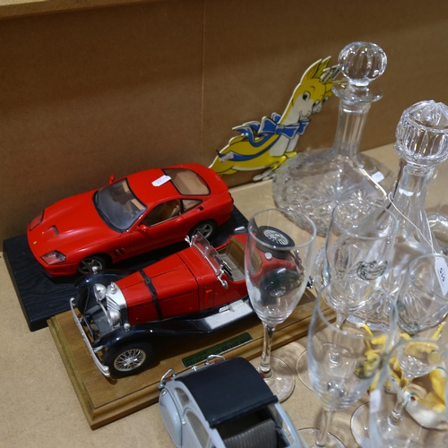 515 - 4 glass decanters and stoppers, Babycham figures, a Maisto Ferrari, a Mercedes, and a Citroen 2CV, e... 