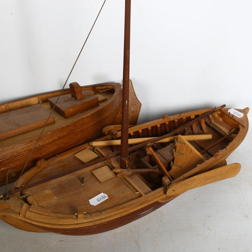 531 - 2 similar wooden yacht or fishing boat models, models appear to be built from specific kits, largest... 