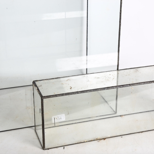 534 - A large glass display case, with lead frame, and 1 other, largest H45cm, L37cm, D28cm (2)