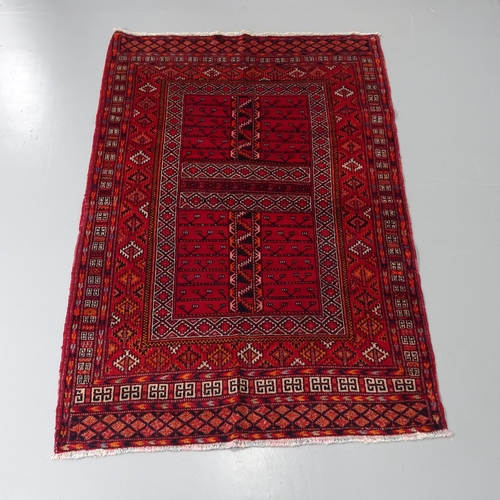 2299 - A red-ground Hamadan rug. 172x110cm