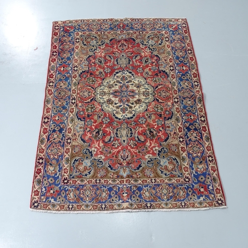 2303 - An Isfihan rug. 195x108cm