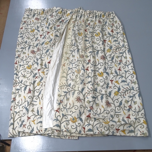 2307 - Two pairs of Crewelwork design curtains. The first drop 178cm and hemmed width 126cm, and the other ... 