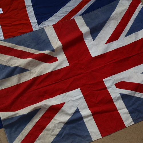 643 - A Piggotts cotton flag, with machine stitched panels, 170 x 84cm, and a smaller printed Union Jack