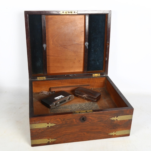 694 - A 19th century mahogany brass-bound travelling vanity case, interior is missing, H15cm, L33cm, D26cm... 