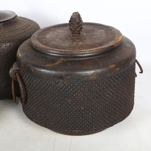 695 - A group of 3 similar Japanese cast-iron cooking pots, largest height 18cm, diameter 22cm