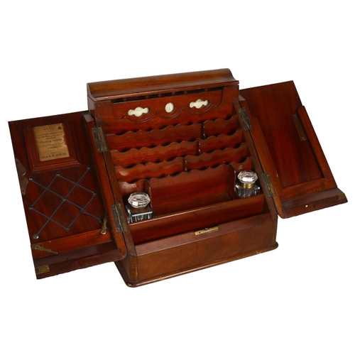 697 - A Victorian mahogany stationery cabinet, interior has scalloped-shaped dividers with pen tray and 2 ... 