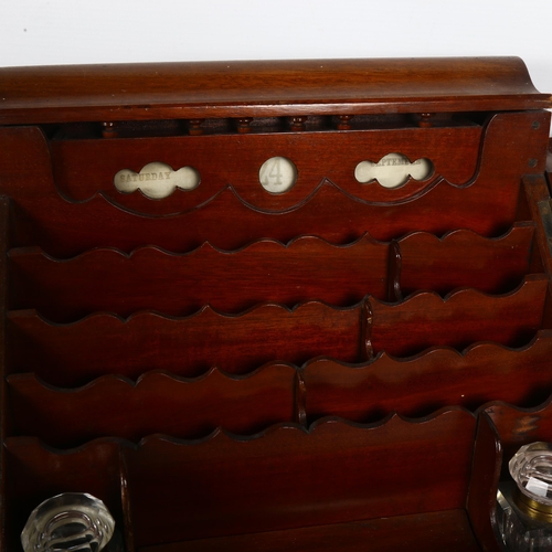 697 - A Victorian mahogany stationery cabinet, interior has scalloped-shaped dividers with pen tray and 2 ... 