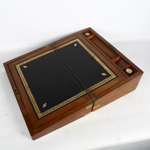 698 - An Antique figured walnut writing slope, with 2 fitted inkwells, and pen tray, H15cm, L40cm, D24cm