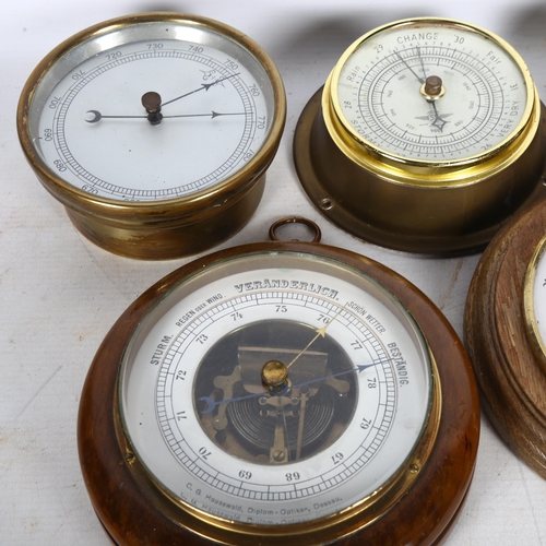 699 - A quantity of Vintage brass and wooden barometers, largest diameter 18cm (5)