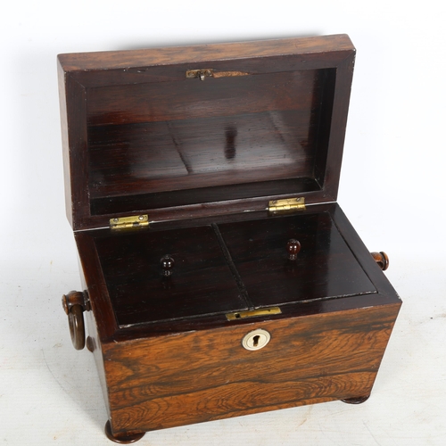 702 - A Regency rosewood tea caddy, with ring handles, inlay missing, H15cm, L20cm, D13cm