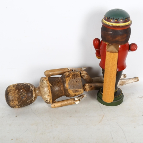 707 - An Antique primitive Folk Art wooden doll, and a modern wood nutcracker, largest length 46cm