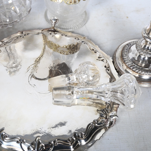 805 - A group of silver plated ware, to include pair of silver plate on copper candlesticks, a cut-glass C... 