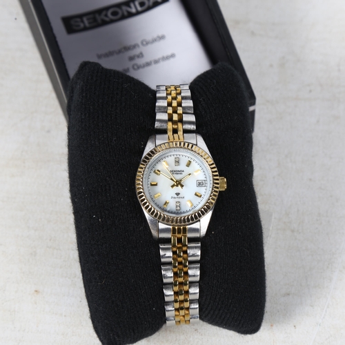 865 - A lady's slimline Sekonda quartz wristwatch, with a mother-of-pearl dial, and diamonds set at 12 and... 