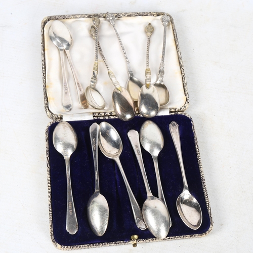 886 - A set of 8 silver teaspoons with golfing motif, and a set of 5 Indian brass teaspoons