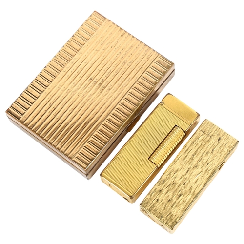 568 - DUNHILL - 2 gold plated Dunhill lighters, differing designs, and a Vintage gold metal compact (3)