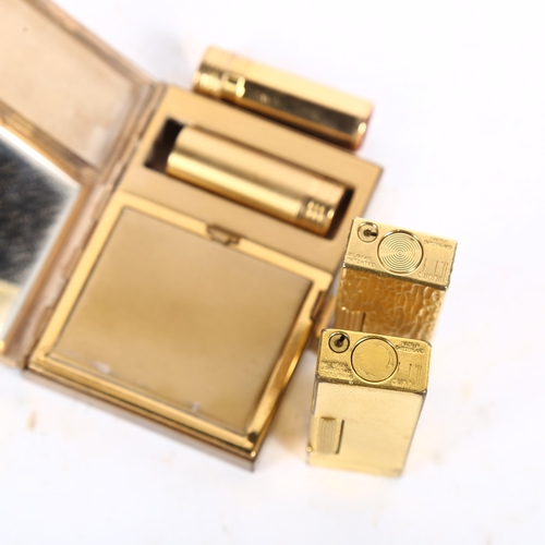 568 - DUNHILL - 2 gold plated Dunhill lighters, differing designs, and a Vintage gold metal compact (3)