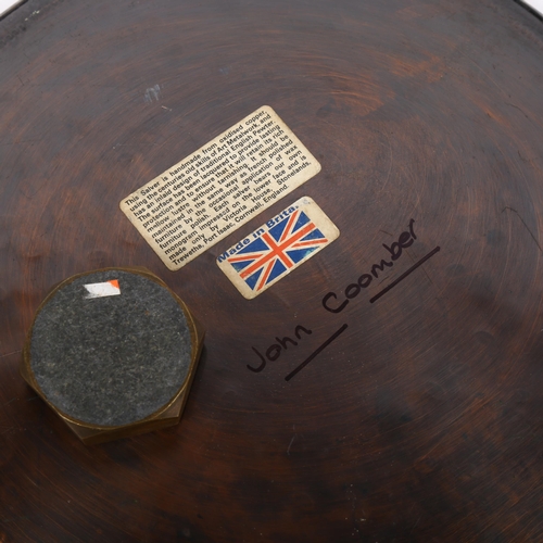 581 - A copper salver with fleur de lis decoration, diameter 28cm, and a Royal Engineers' Military coat of... 