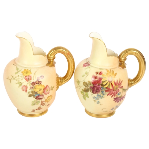 584 - ROYAL WORCESTER - 2 similar Royal Worcester hand painted blush ivory jugs, with floral decoration, H... 