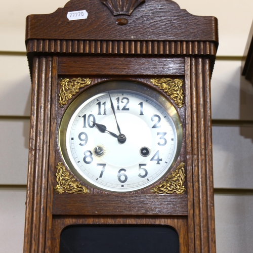 599 - A Vintage stained oak 8-day drop-dial wall clock, case height 55cm, with pendulum