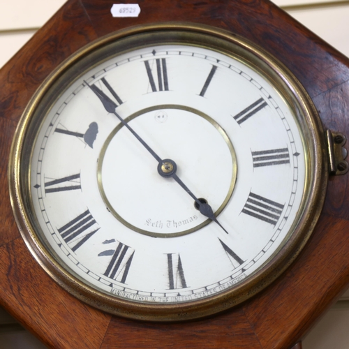 600 - A mahogany-cased drop-dial wall clock, by Seth Thomas, height 55cm