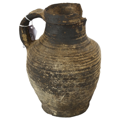 640 - A Rheinland high fired ceramic jug, circa 14th century, height 23cm