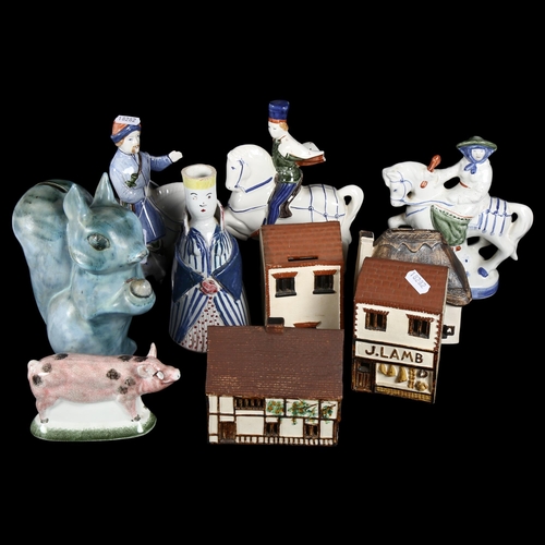 645 - A group of various Rye Pottery, including O'Donoghue cottage money boxes, David Sharp squirrel and b... 