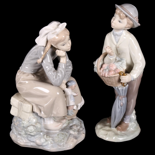 658 - Lladro boy with a basket of vegetables, 24cm, and a Lladro girl with doll and basket