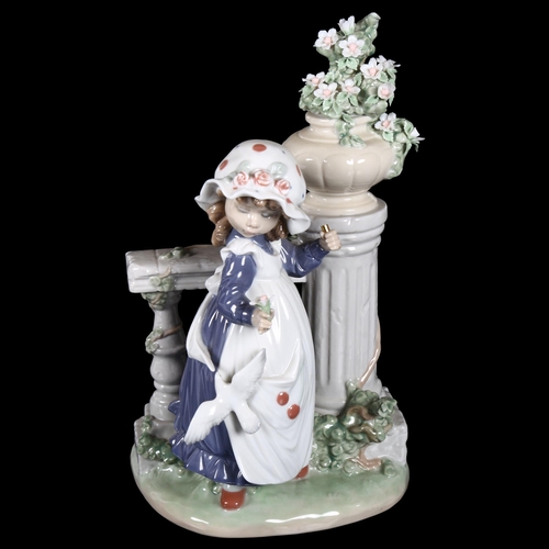 659 - Lladro group of a girl and dove gathering flowers, H28cm