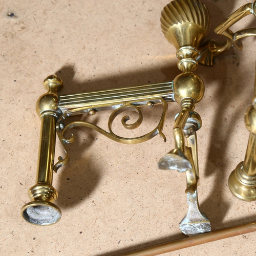 664 - A long-handled 3-piece brass fire companion set, and a pair of andirons