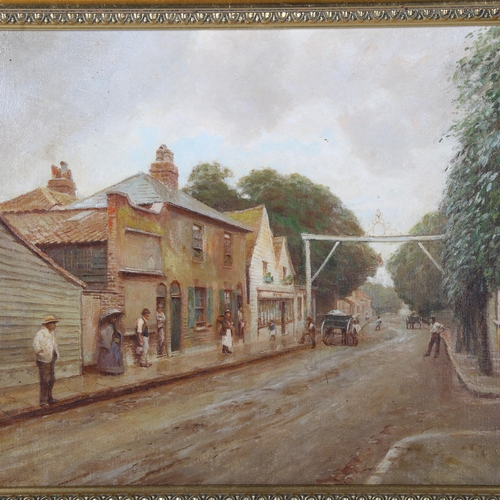 2906 - Oil on canvas, village street scene with figures and horse-drawn carts, indistinctly signed bottom l... 