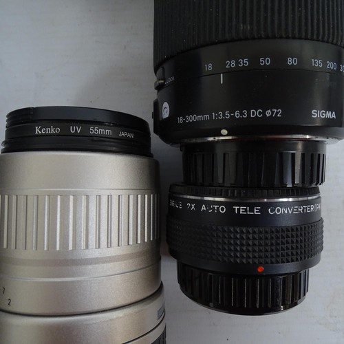 233 - Pentax Sigma camera lenses, photo editing software cds etc.