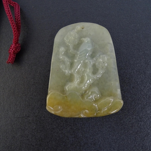 108 - 4 various Chinese carved jade pendants, all with carved and relief decoration, tallest 7cm