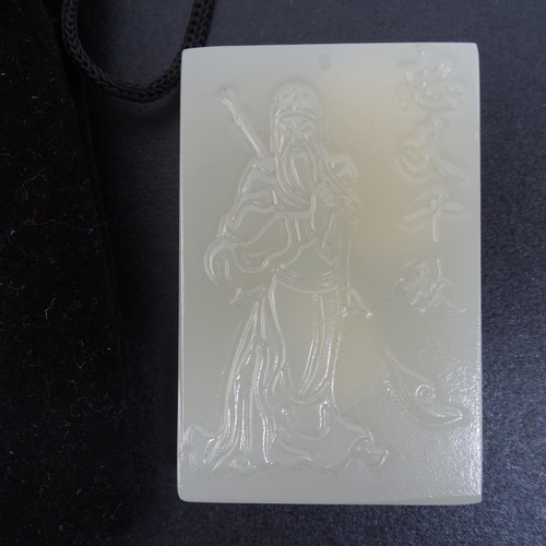 108 - 4 various Chinese carved jade pendants, all with carved and relief decoration, tallest 7cm