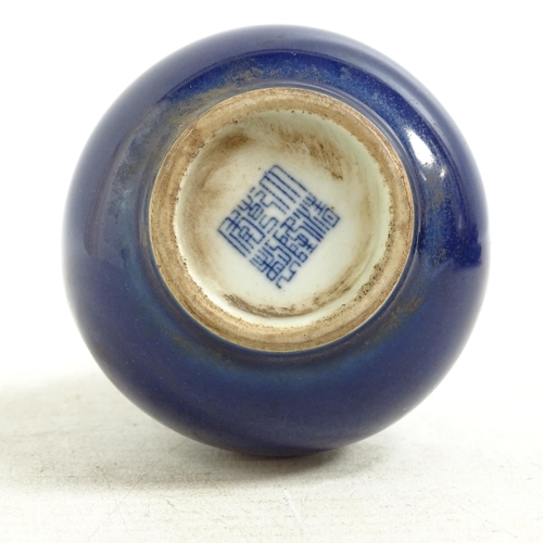 182 - A Chinese blue glazed bottle vase, with blue seal marks to the base, H15cm