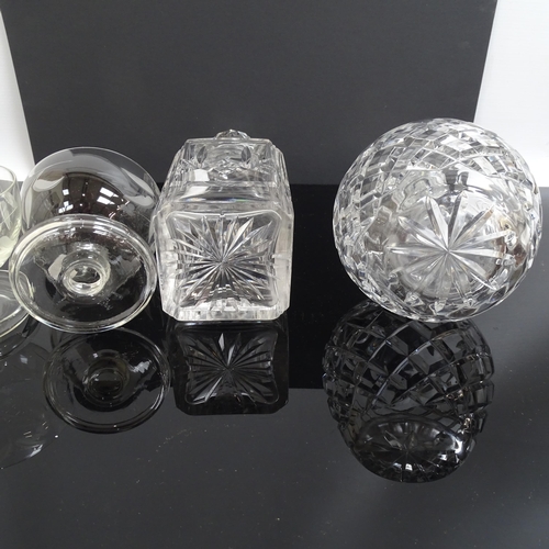 752 - A set of 6 etched glass Sundae dishes and 2 cut glass decanters.