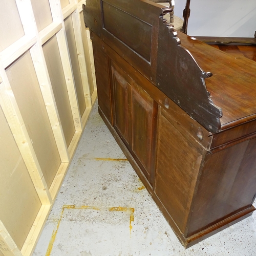 2524 - A Victorian mahogany inverted break front sideboard, with raised carved back and panelled cupboards ... 