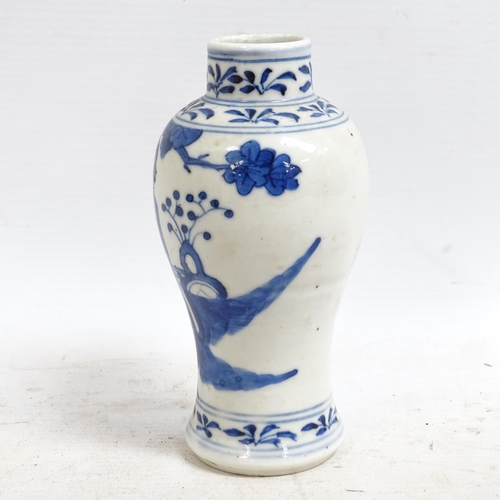 130 - An Antique Chinese blue and white baluster vase of small size, hand painted figural decoration with ... 