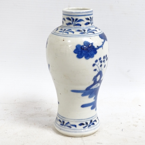 130 - An Antique Chinese blue and white baluster vase of small size, hand painted figural decoration with ... 