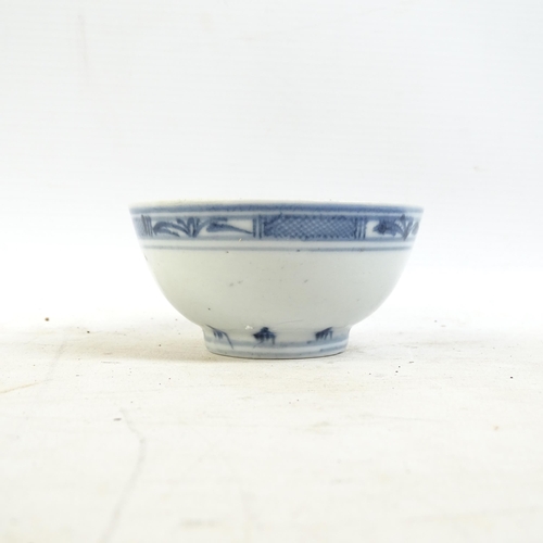 164 - A Chinese blue and white tea bowl, and a blue and white tea bowl with red fish decorated border, and... 