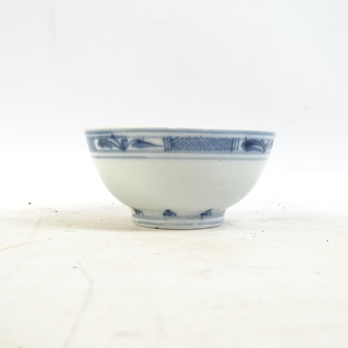 164 - A Chinese blue and white tea bowl, and a blue and white tea bowl with red fish decorated border, and... 