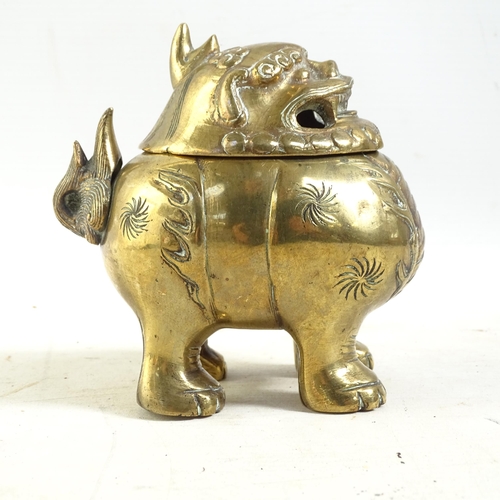 183 - A Chinese brass dog of fo censer, with engraved and embossed decoration and hinged lid, H12cm