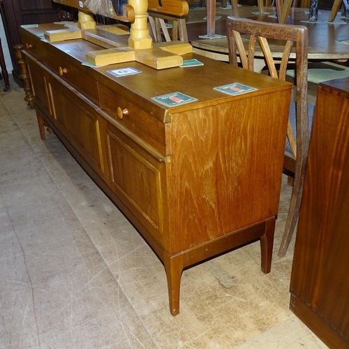 2096 - A mid-century teak sideboard, with label for Stateroom by Stonehill Furniture. 183x72x47cm