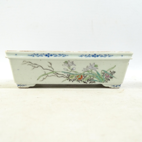 128 - A Chinese rectangular porcelain bonsai tree jardiniere, with famille rose hand painted floral decora... 