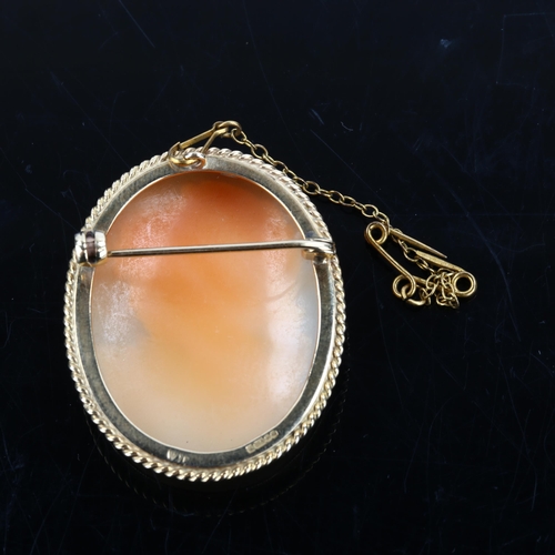 1184 - A Vintage shell cameo brooch, depicting female profile in 9ct frame, brooch height 37.9mm, 8.9g